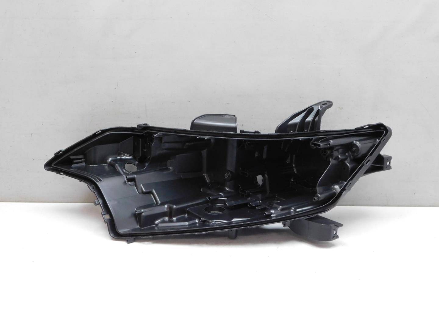 Корпус фары левой