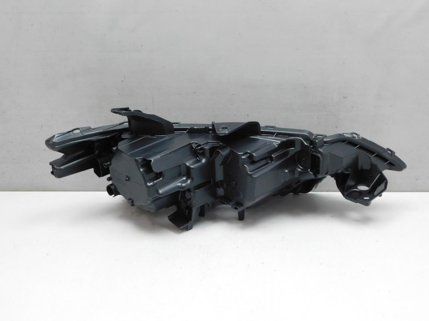 Корпус фары левой