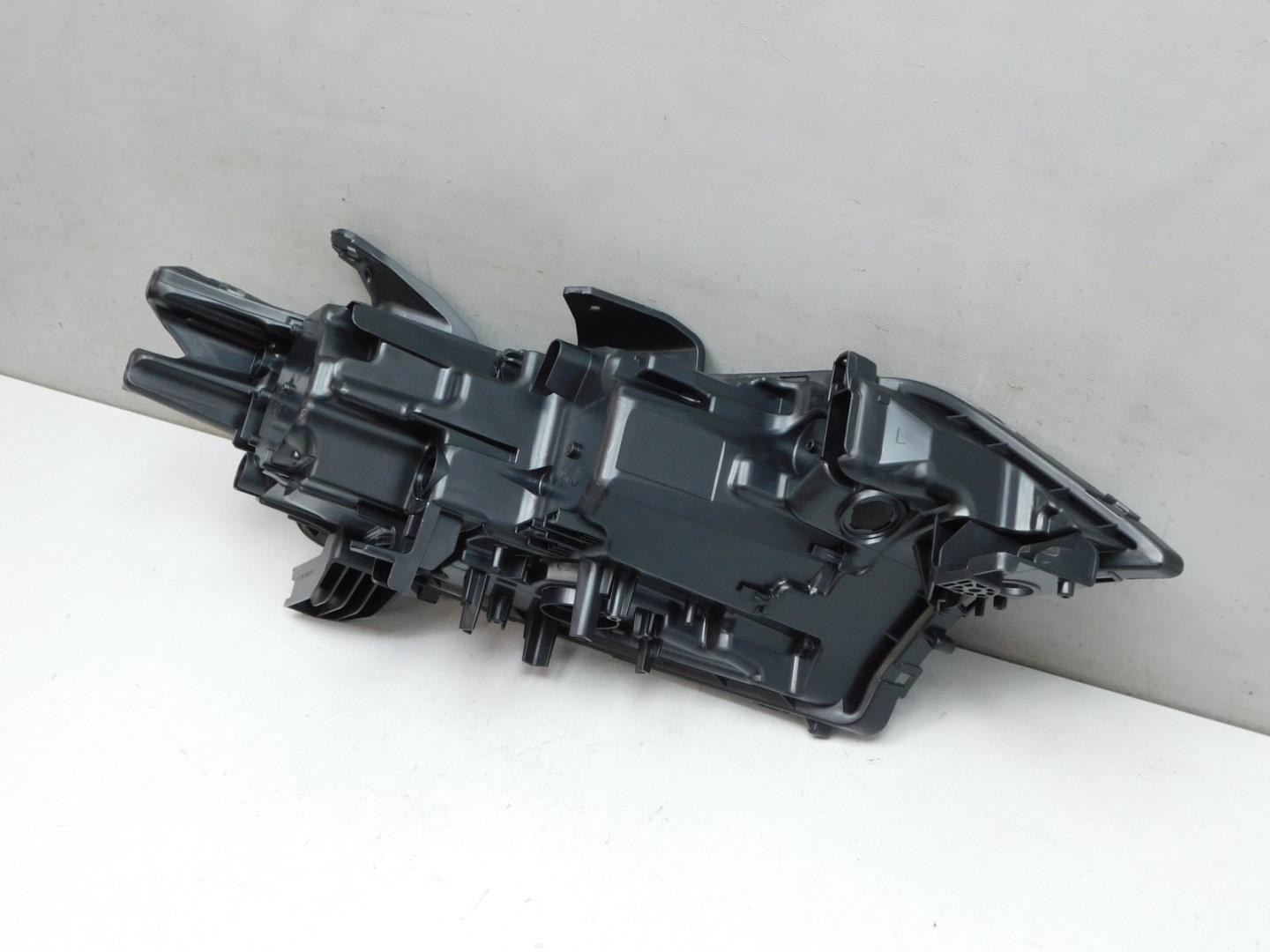 Корпус фары левой