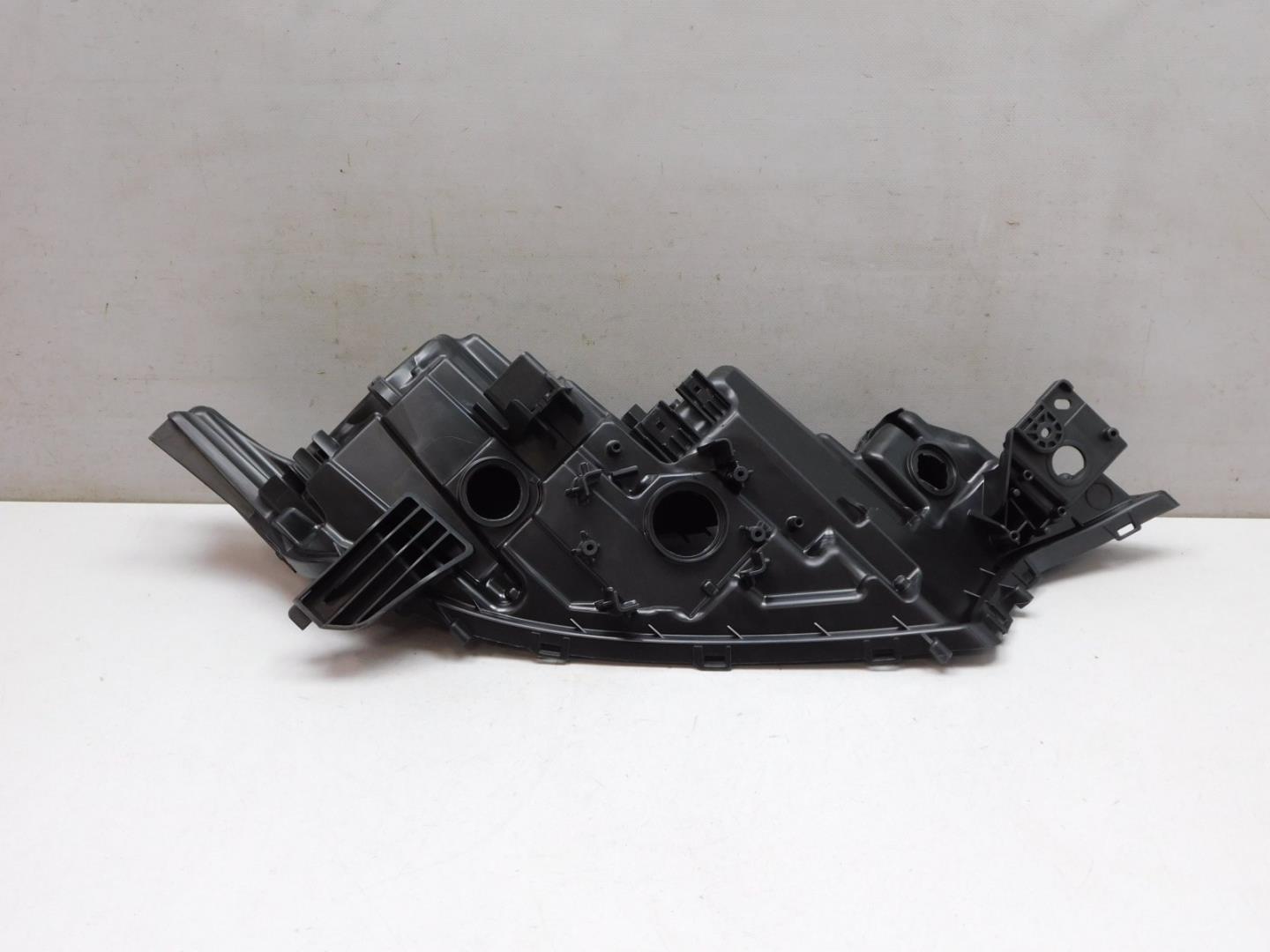 Корпус фары левой