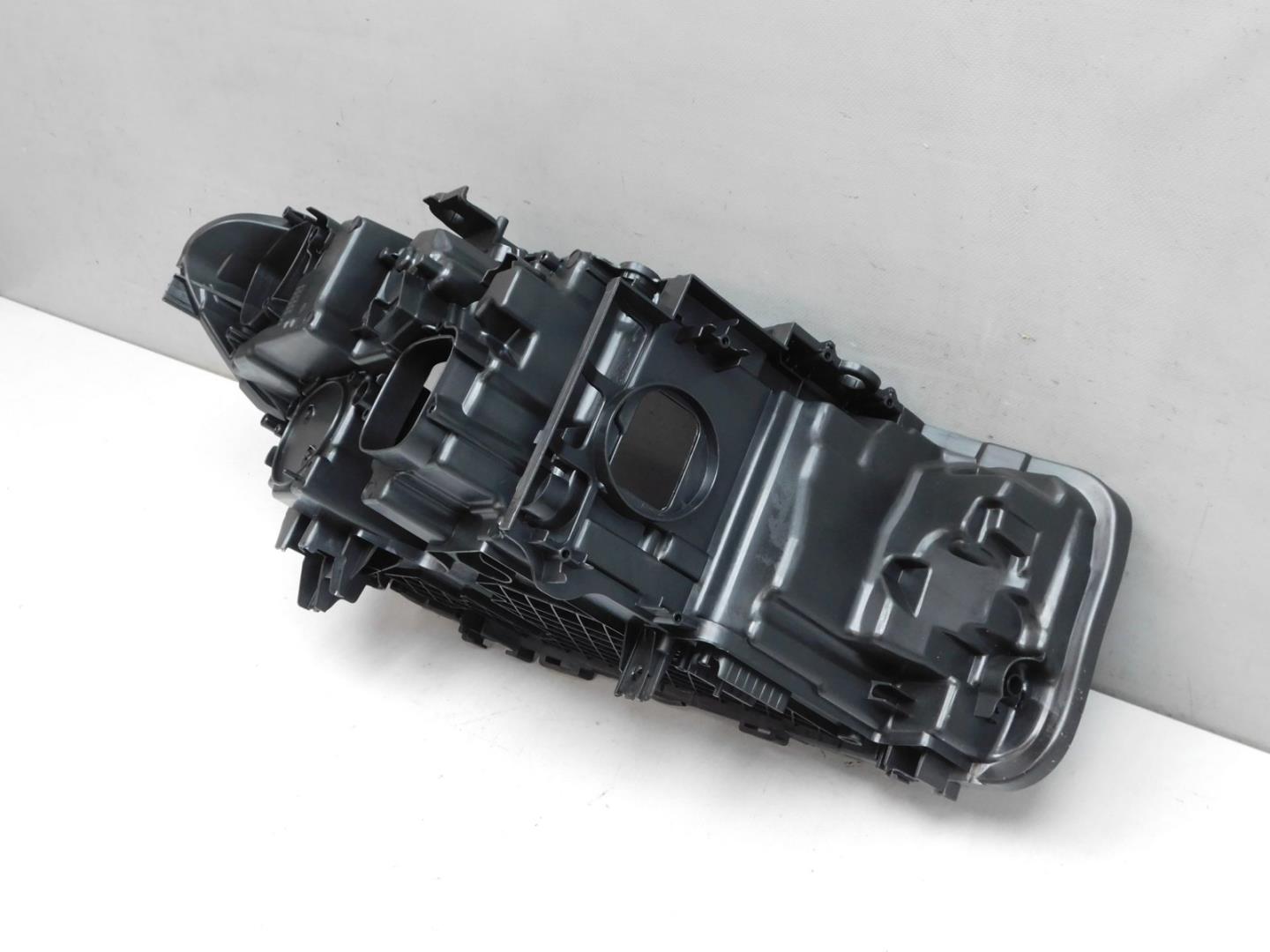 Корпус фары левой