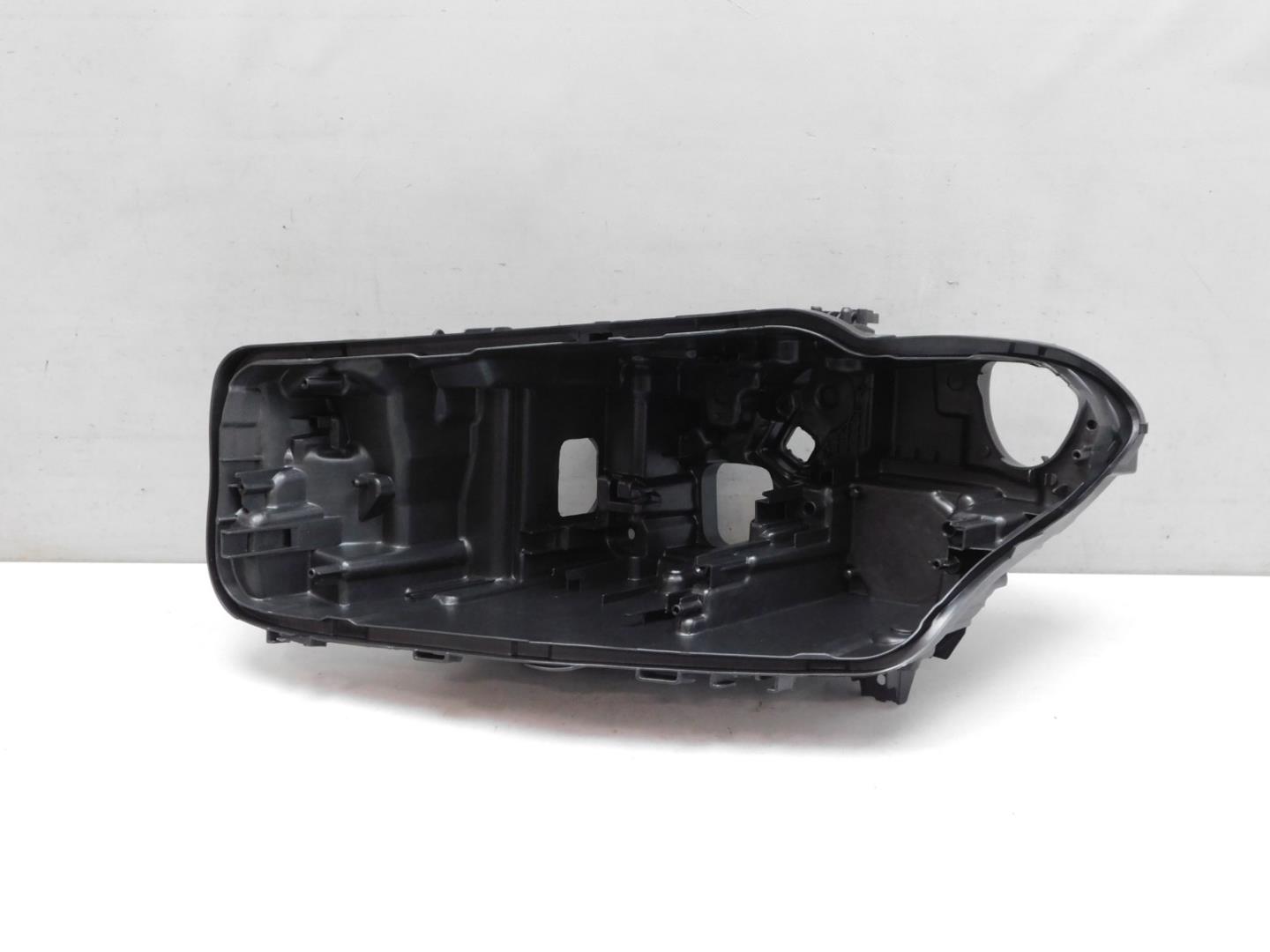 Корпус фары левой