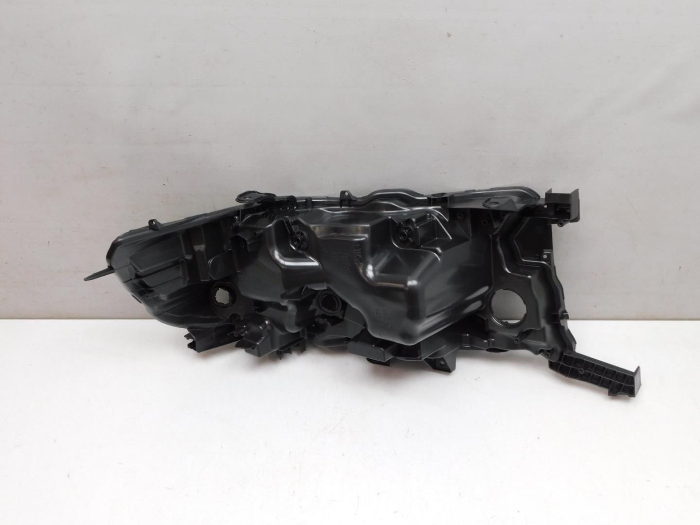 Корпус фары левой