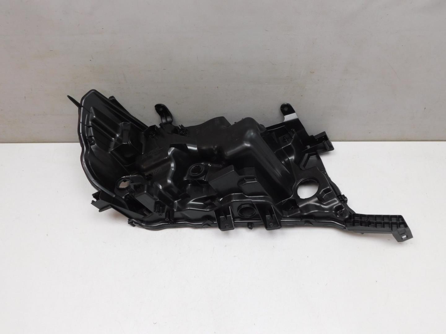 Корпус фары левой