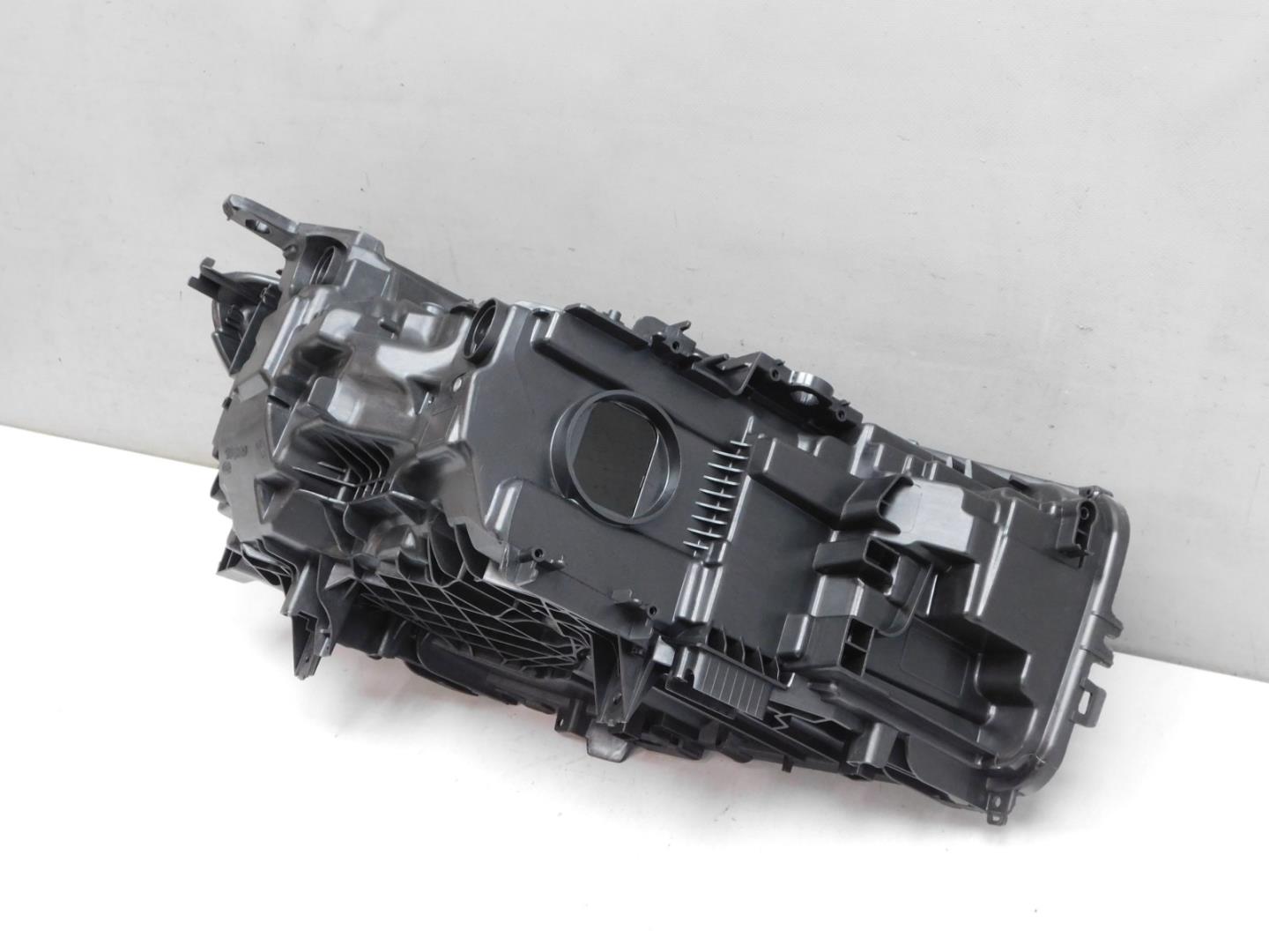 Корпус фары левой