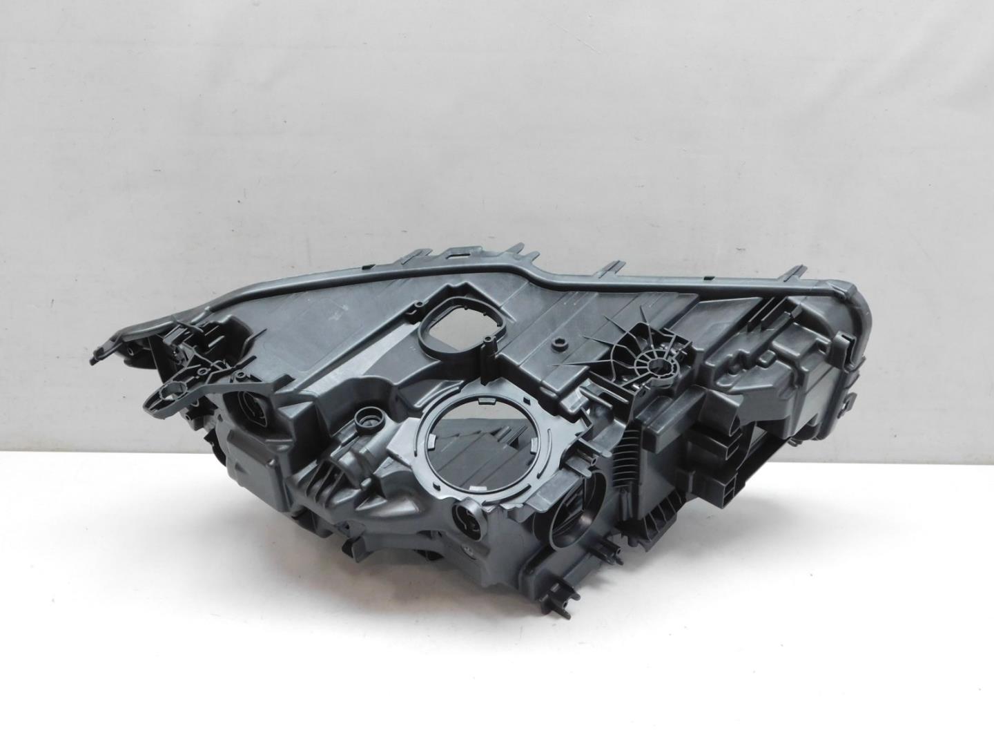 Корпус фары левой