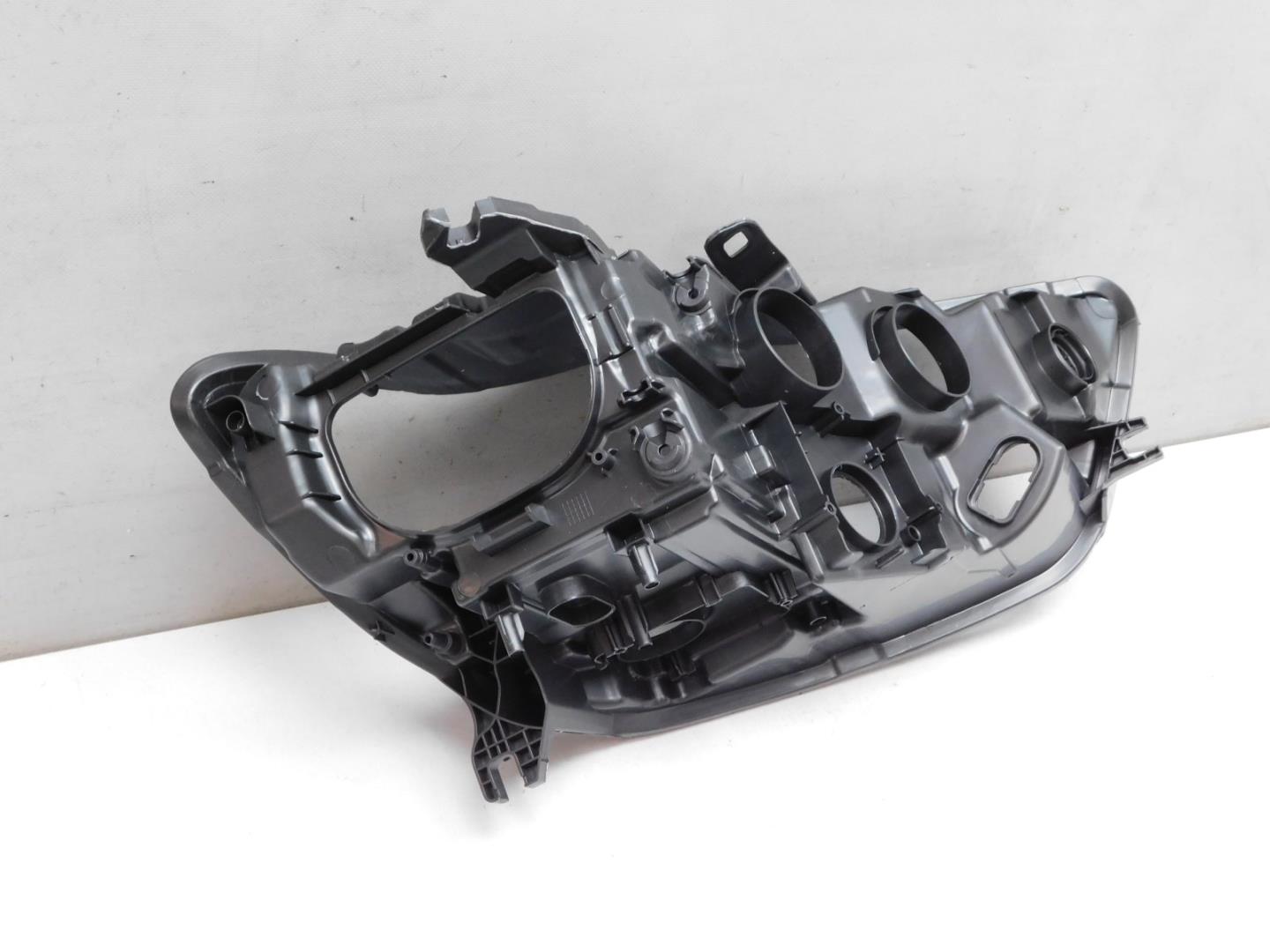 Корпус фары левой