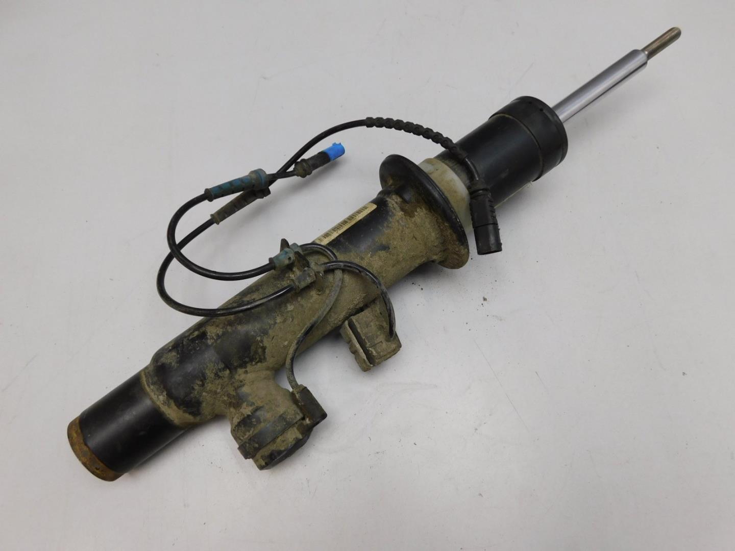 Амортизатор передний левый