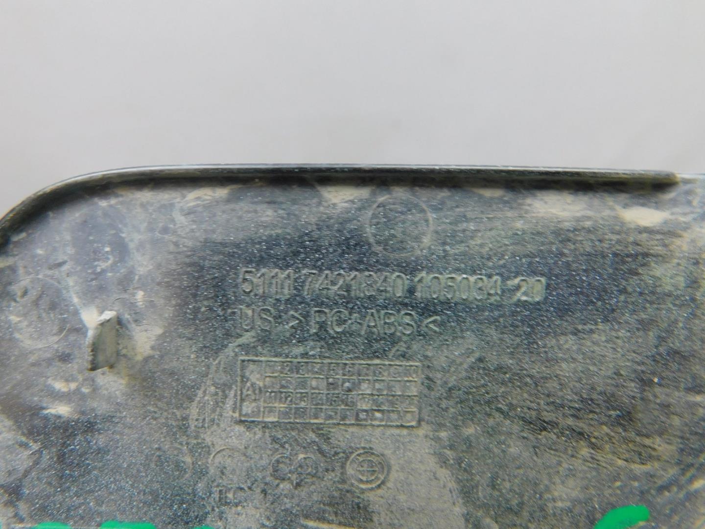 Заглушка буксировочного крюка