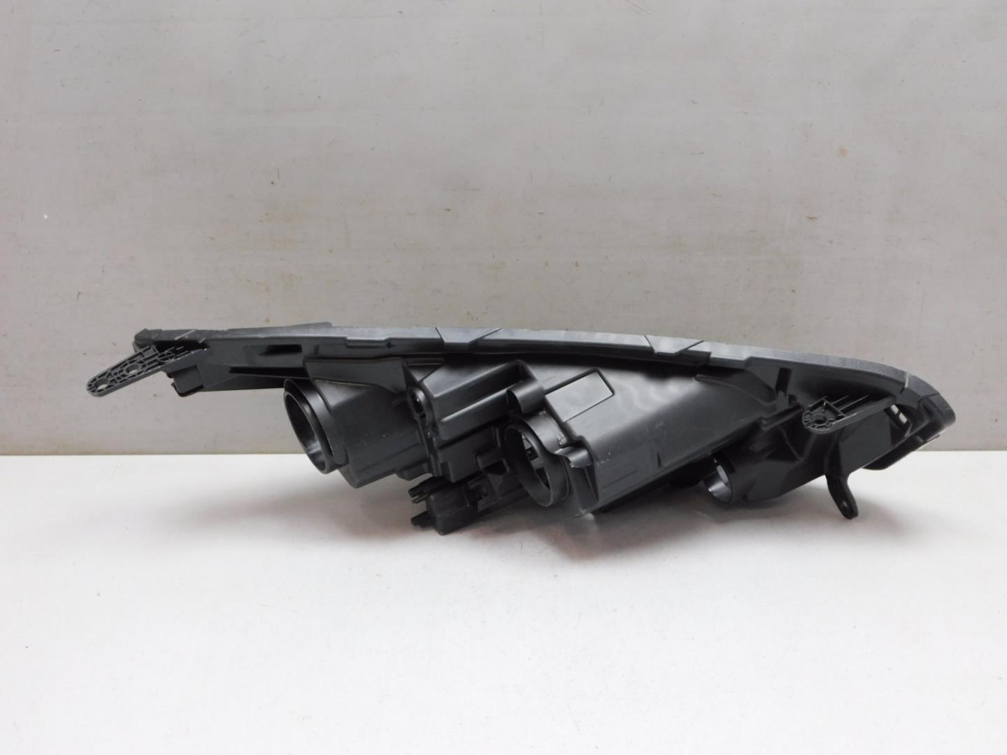 Корпус фары левой