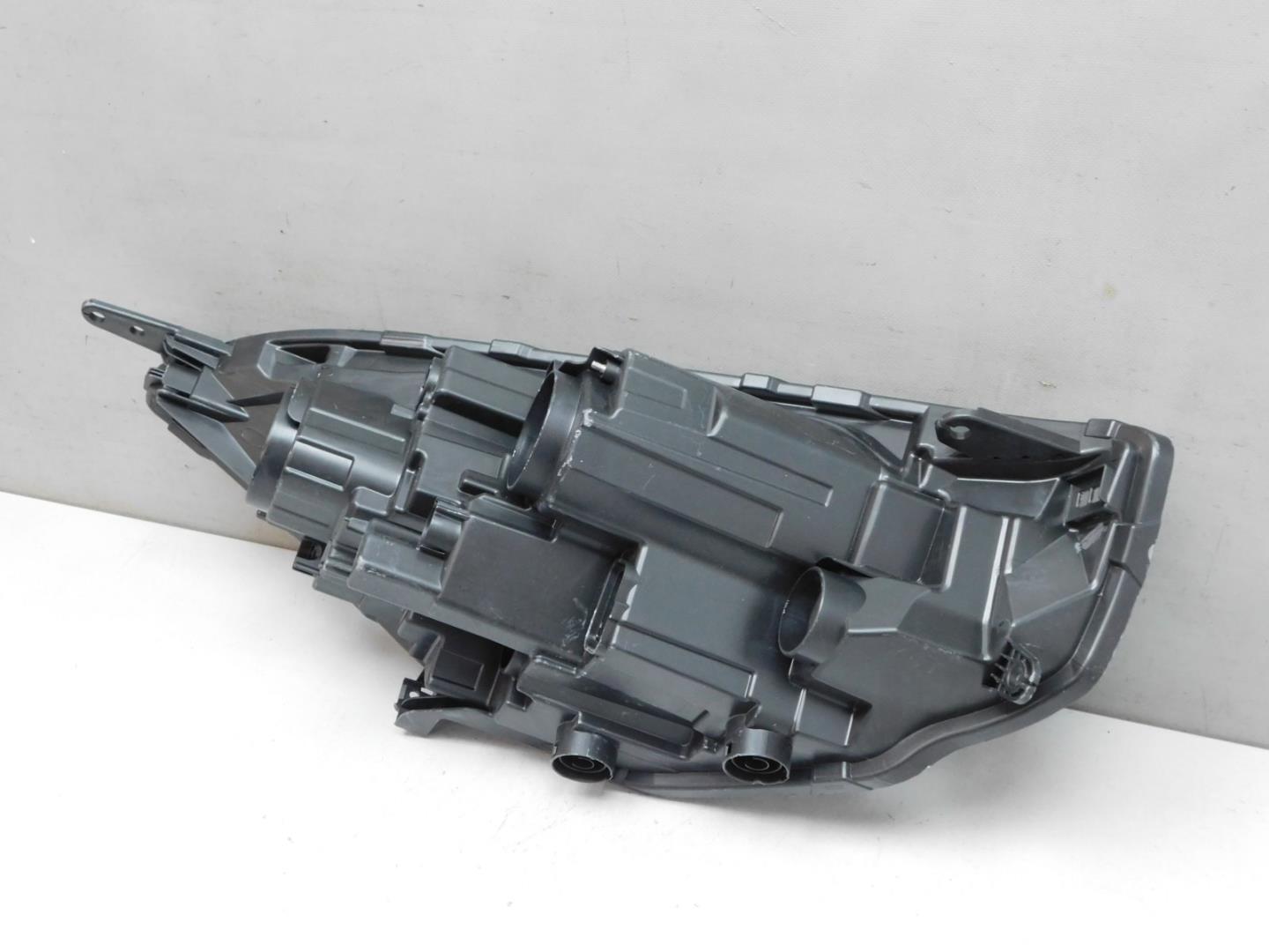 Корпус фары левой