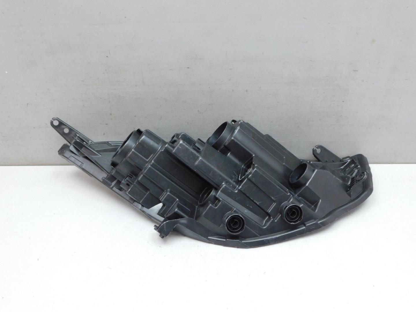 Корпус фары левой