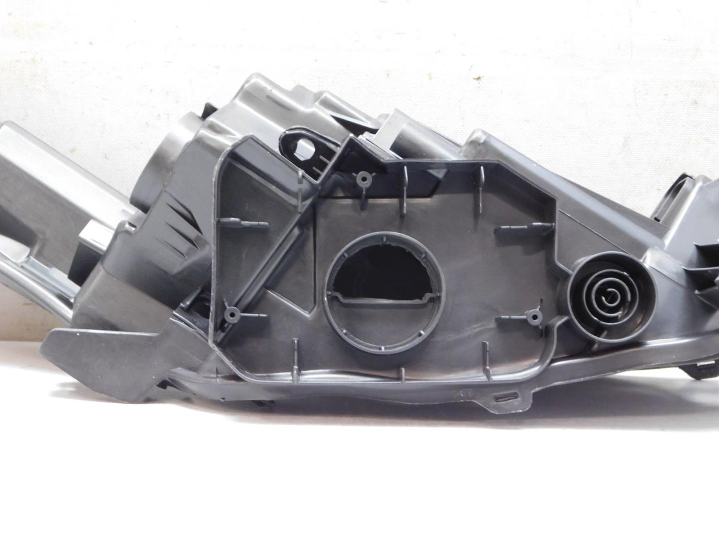 Корпус фары левой