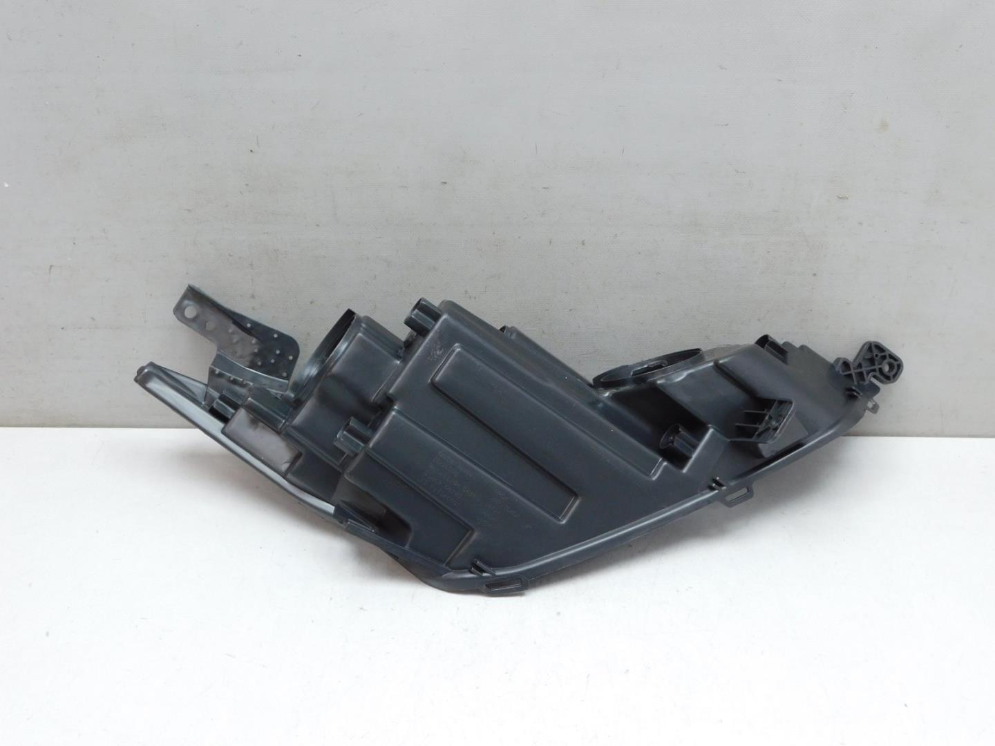 Корпус фары левой