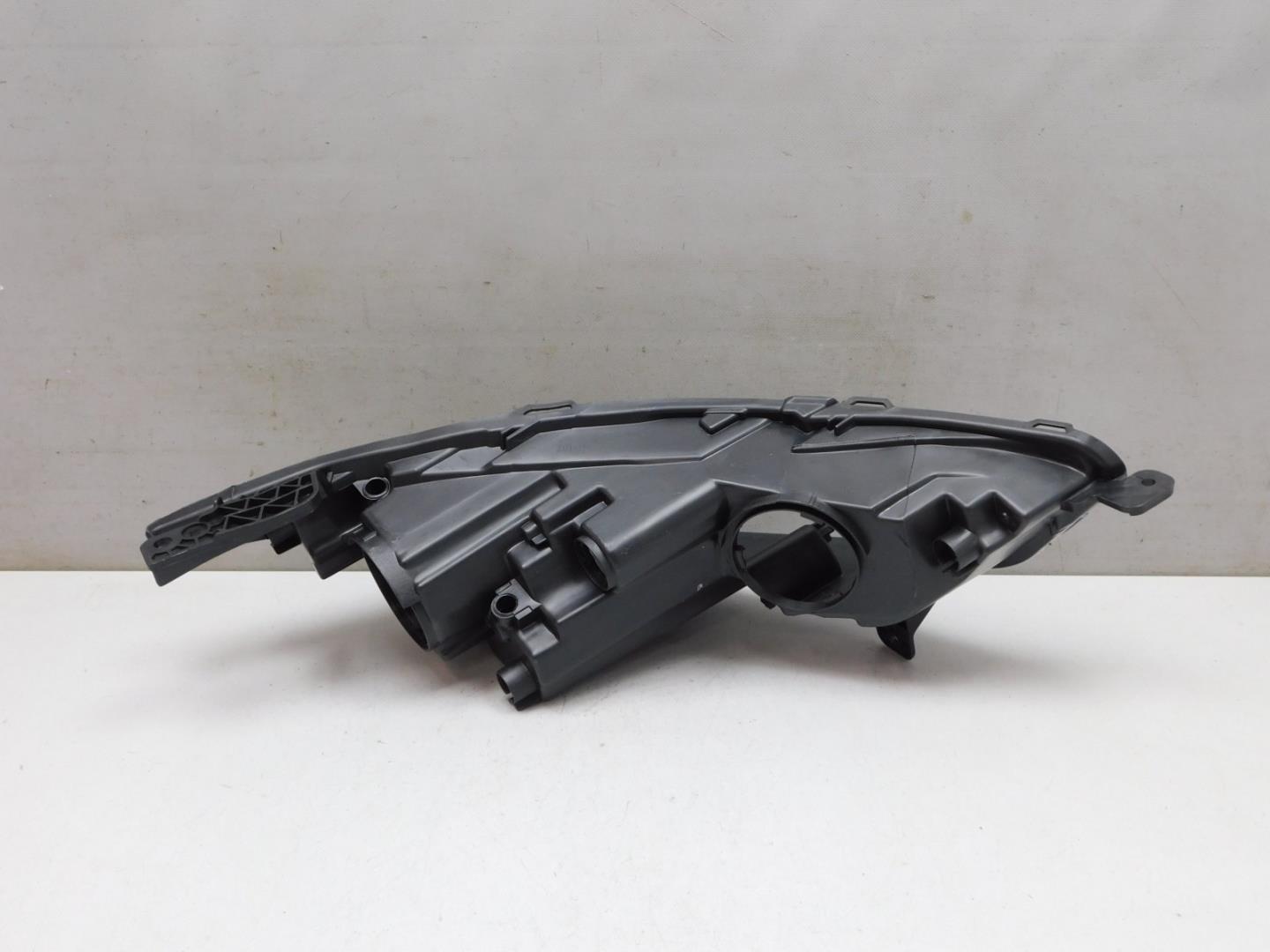 Корпус фары левой