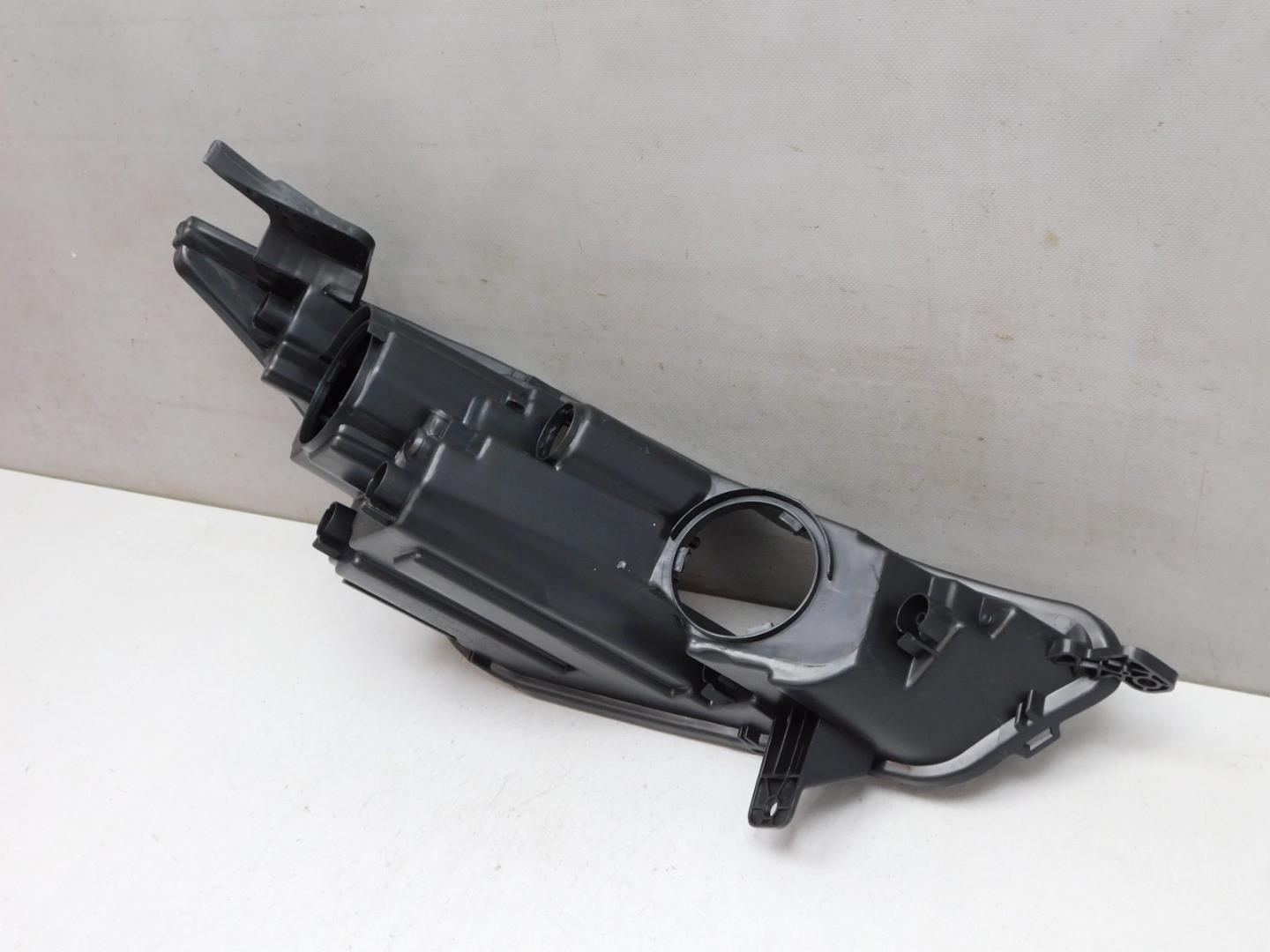 Корпус фары левой