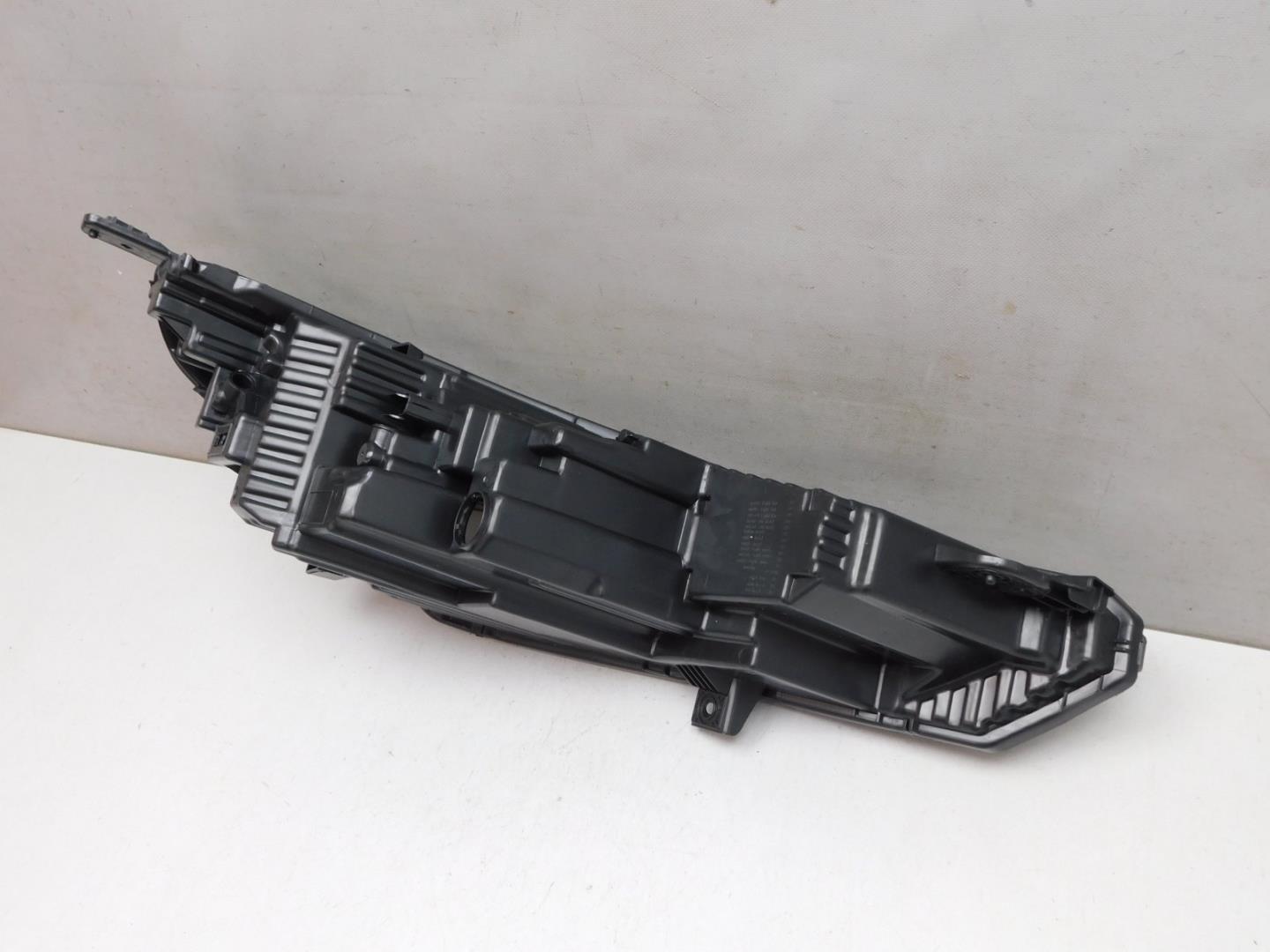 Корпус фары левой