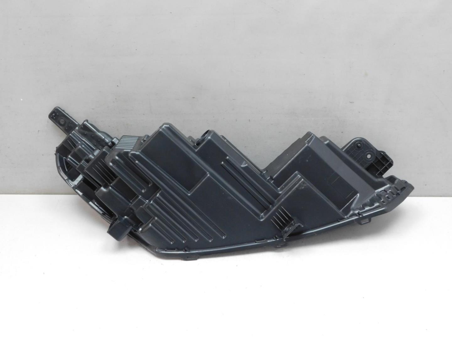 Корпус фары левой