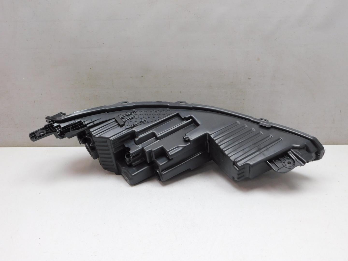 Корпус фары левой