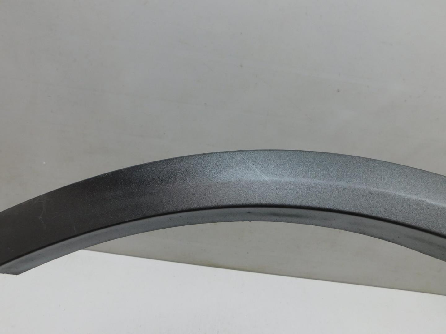 Накладка заднего крыла левого