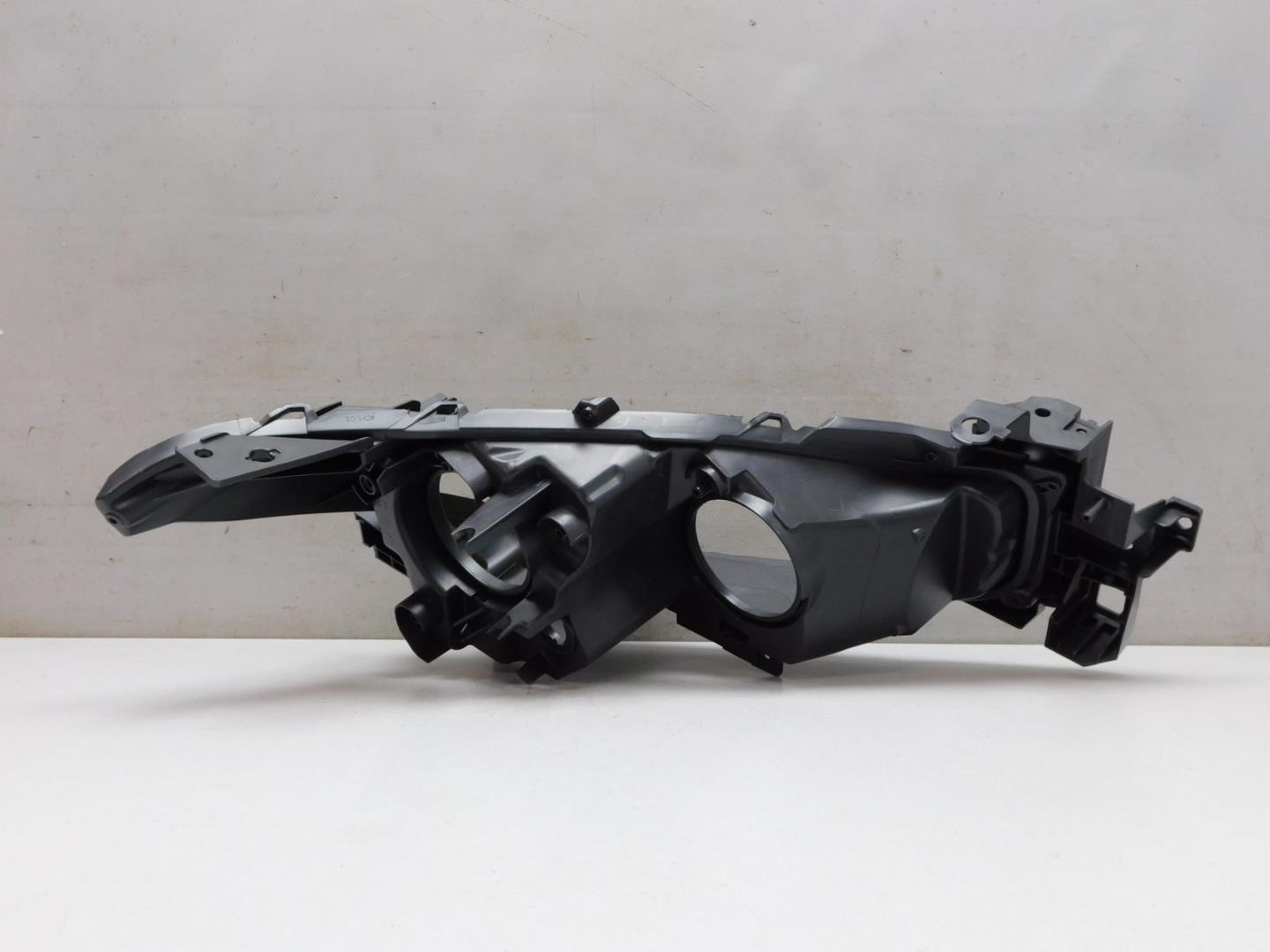 Корпус фары левой