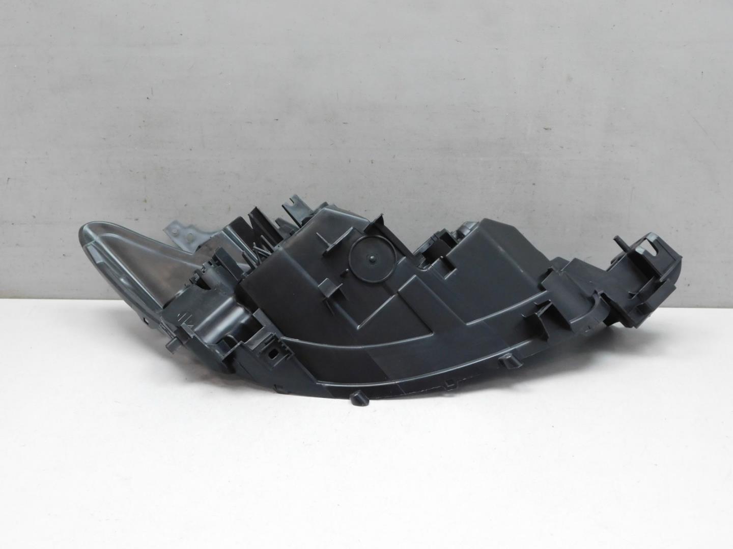 Корпус фары левой