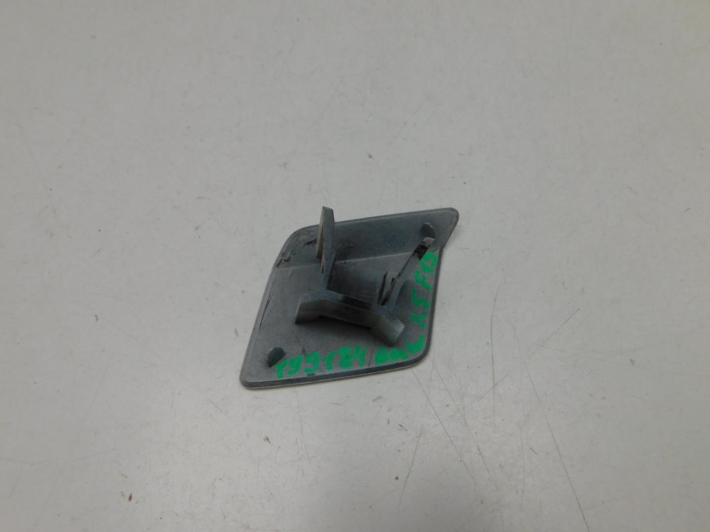 Крышка форсунки омывателя фар