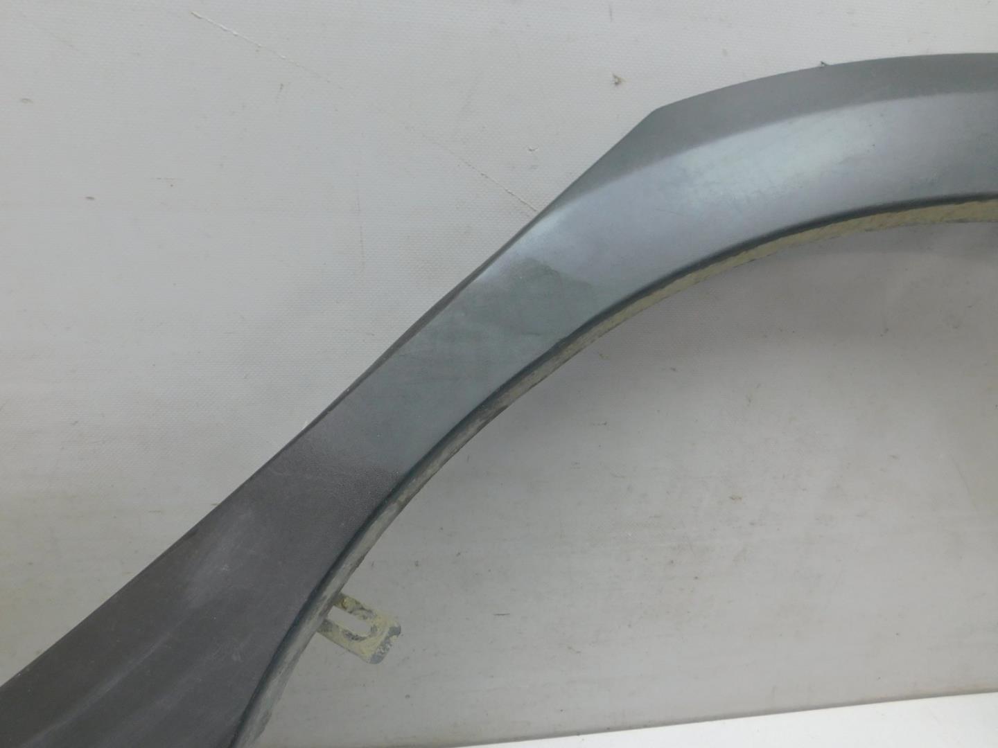 Накладка заднего крыла левого