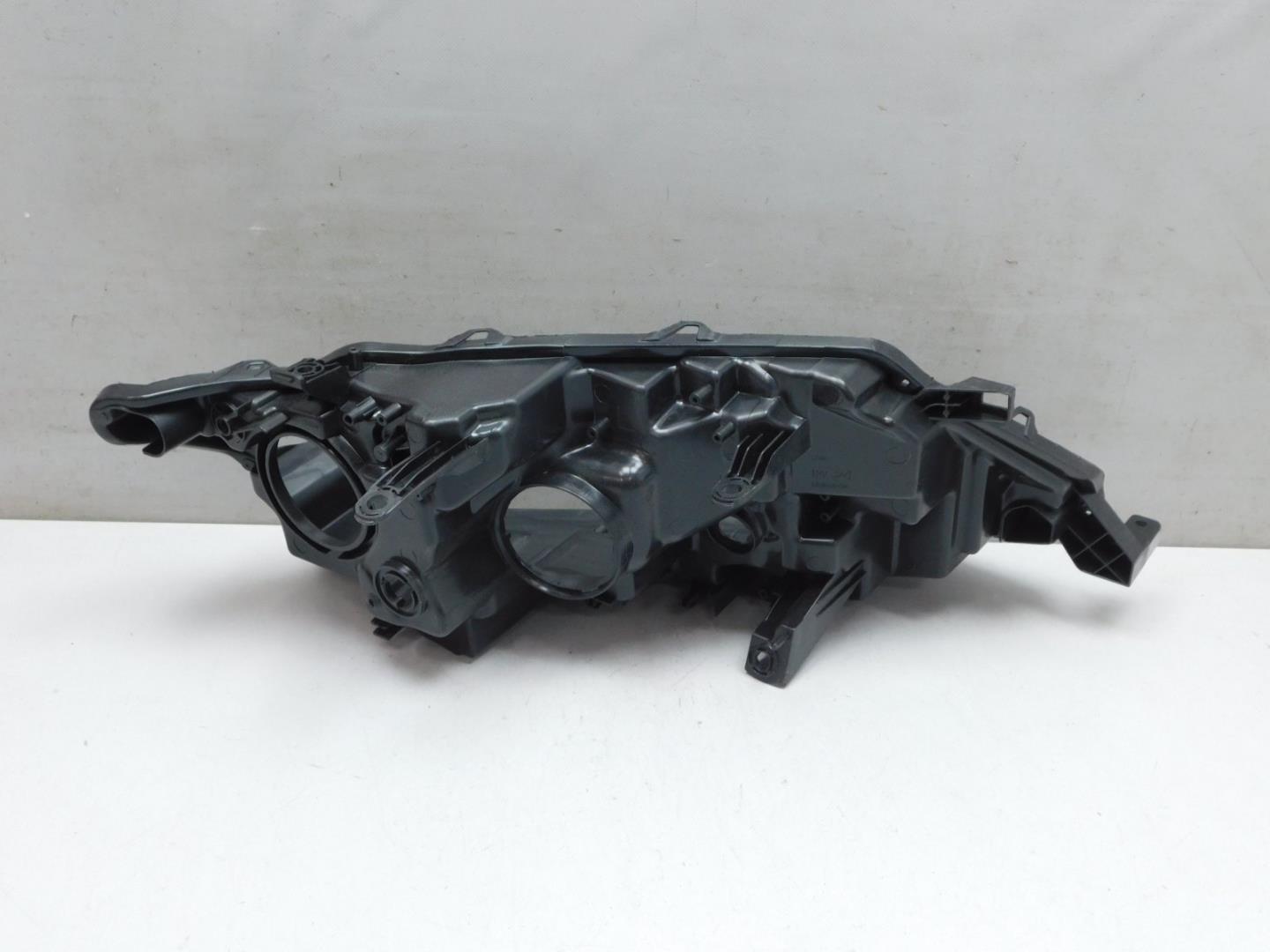 Корпус фары левой