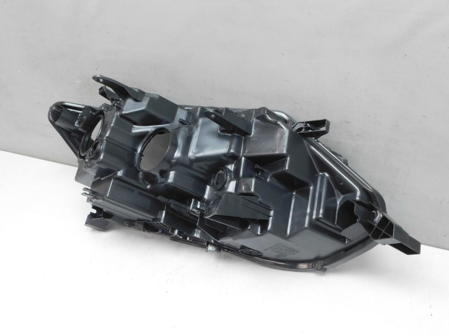 Корпус фары левой