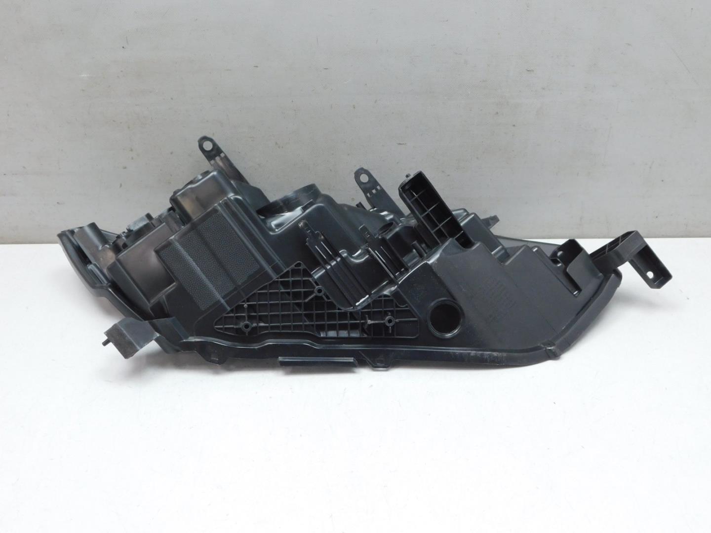 Корпус фары левой