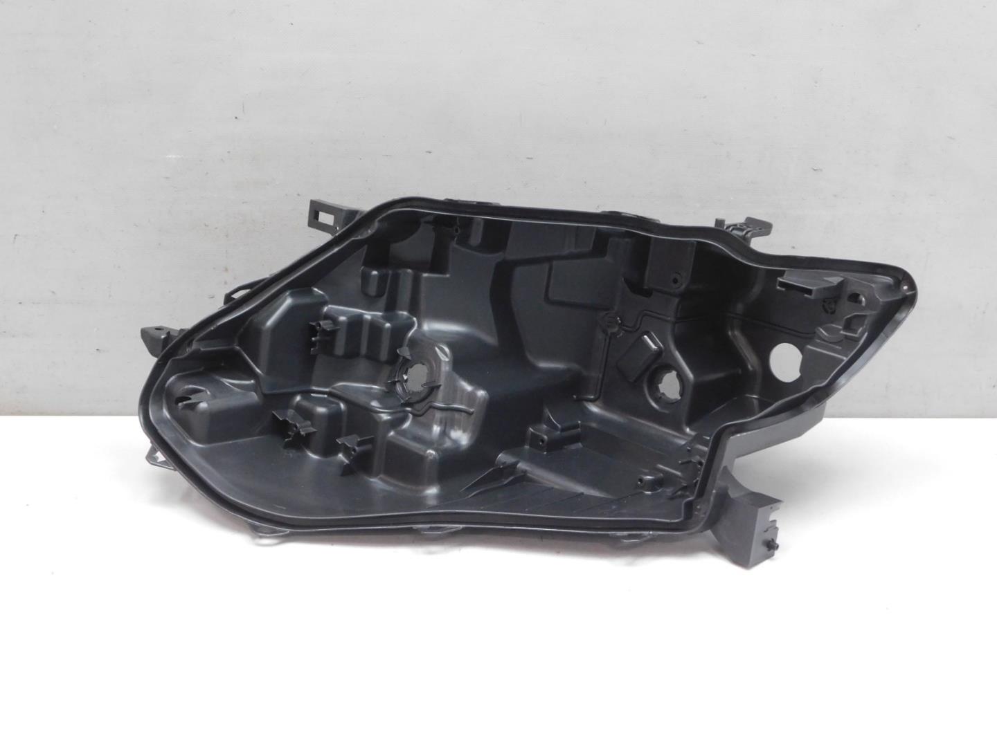 Корпус фары левой