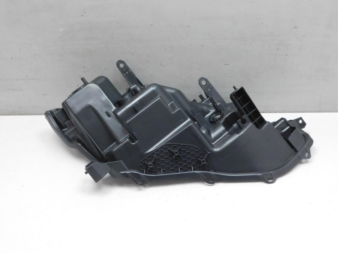 Корпус фары левой