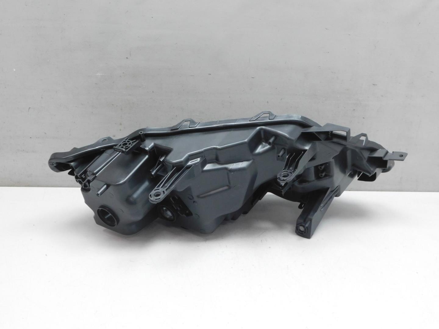 Корпус фары левой