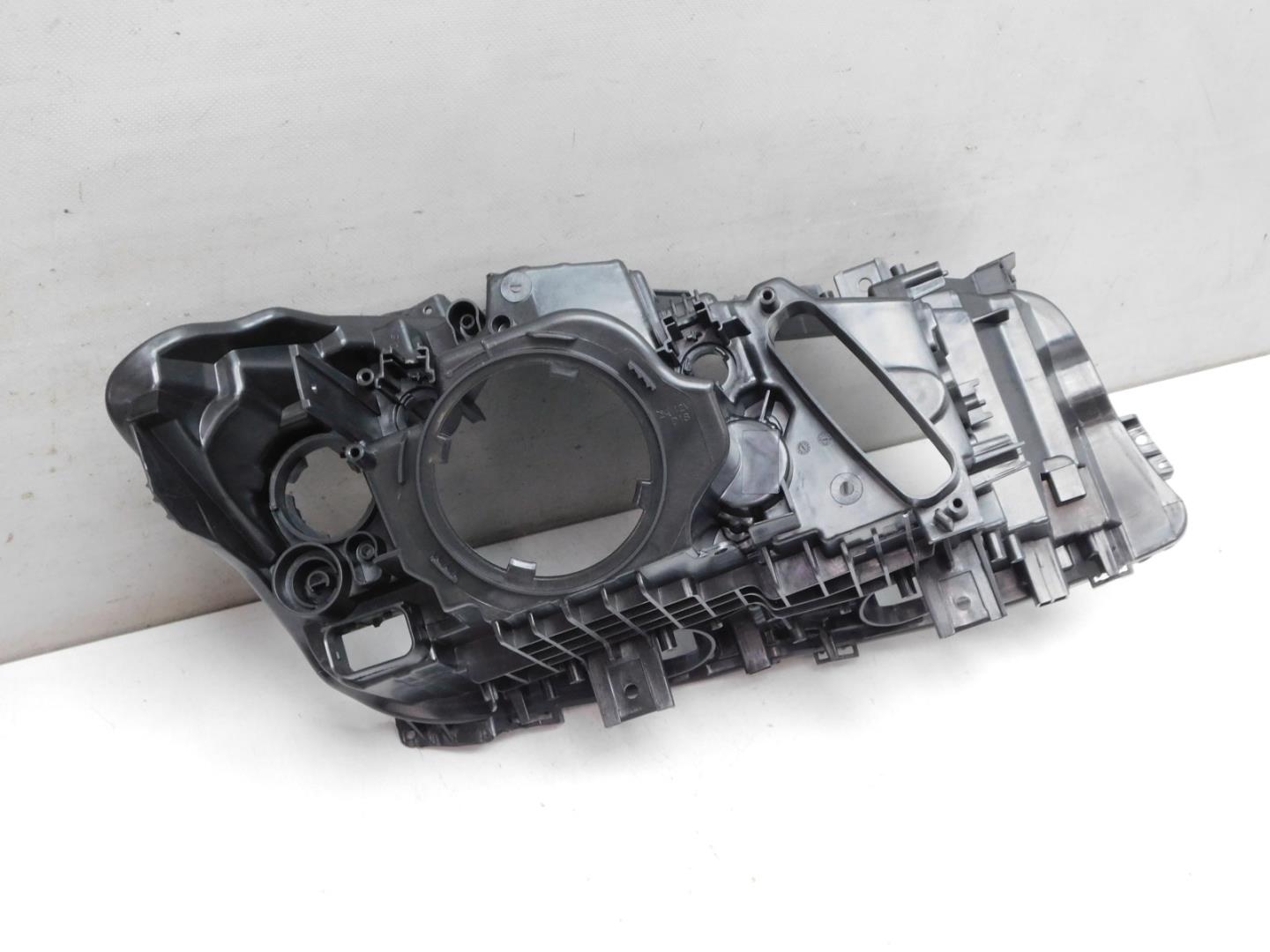 Корпус фары левой