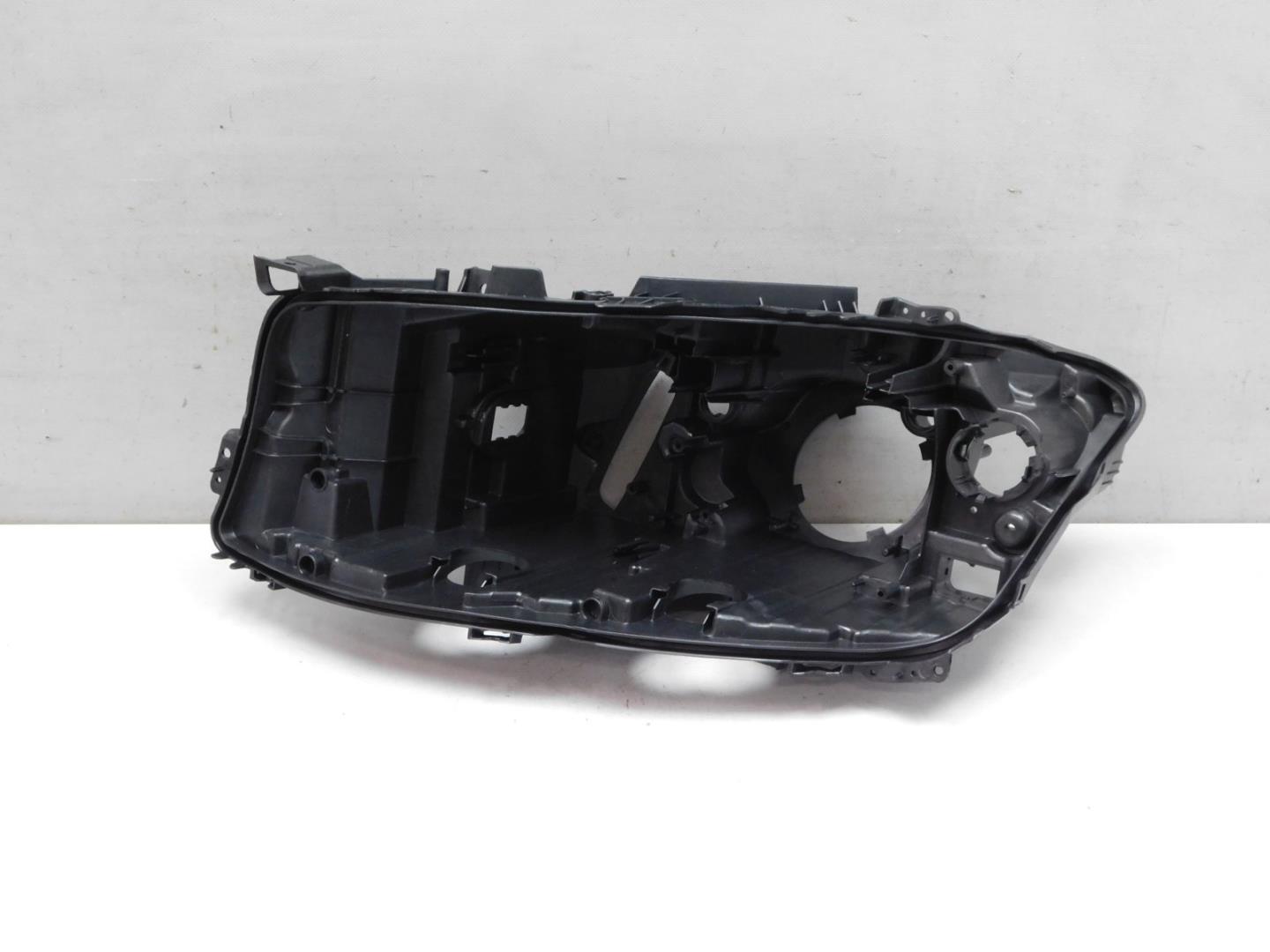 Корпус фары левой