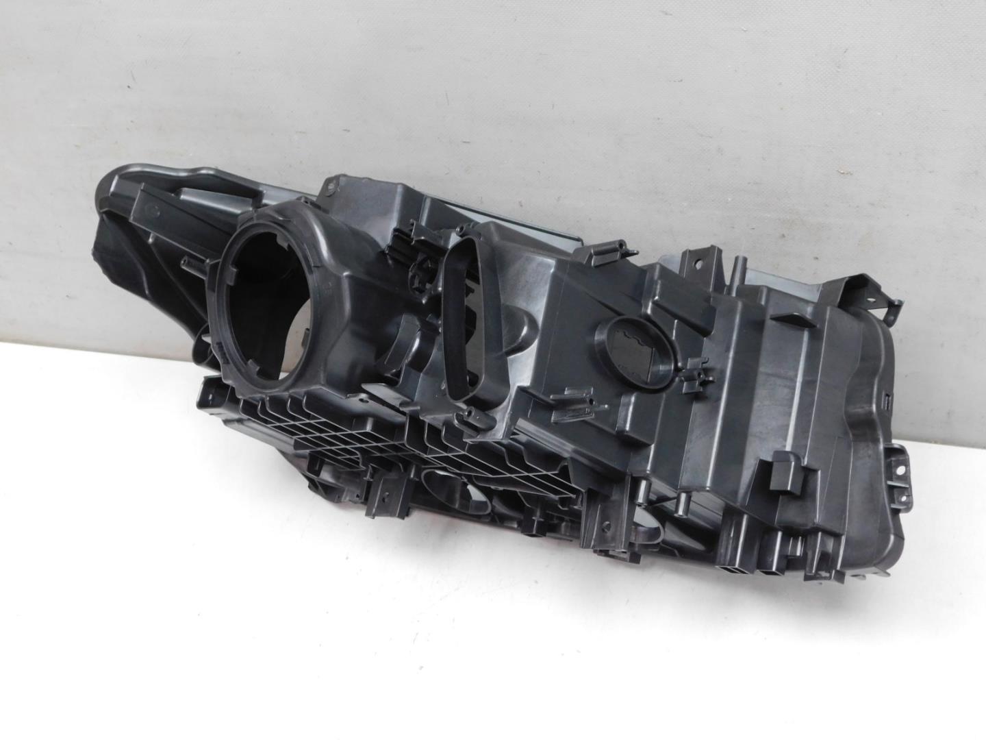 Корпус фары левой