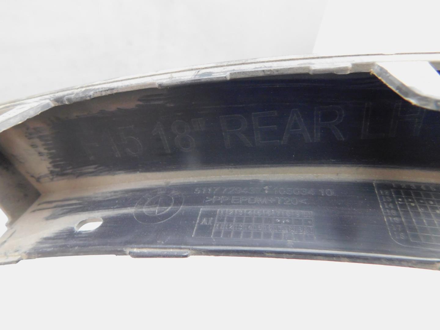 Накладка заднего крыла левого