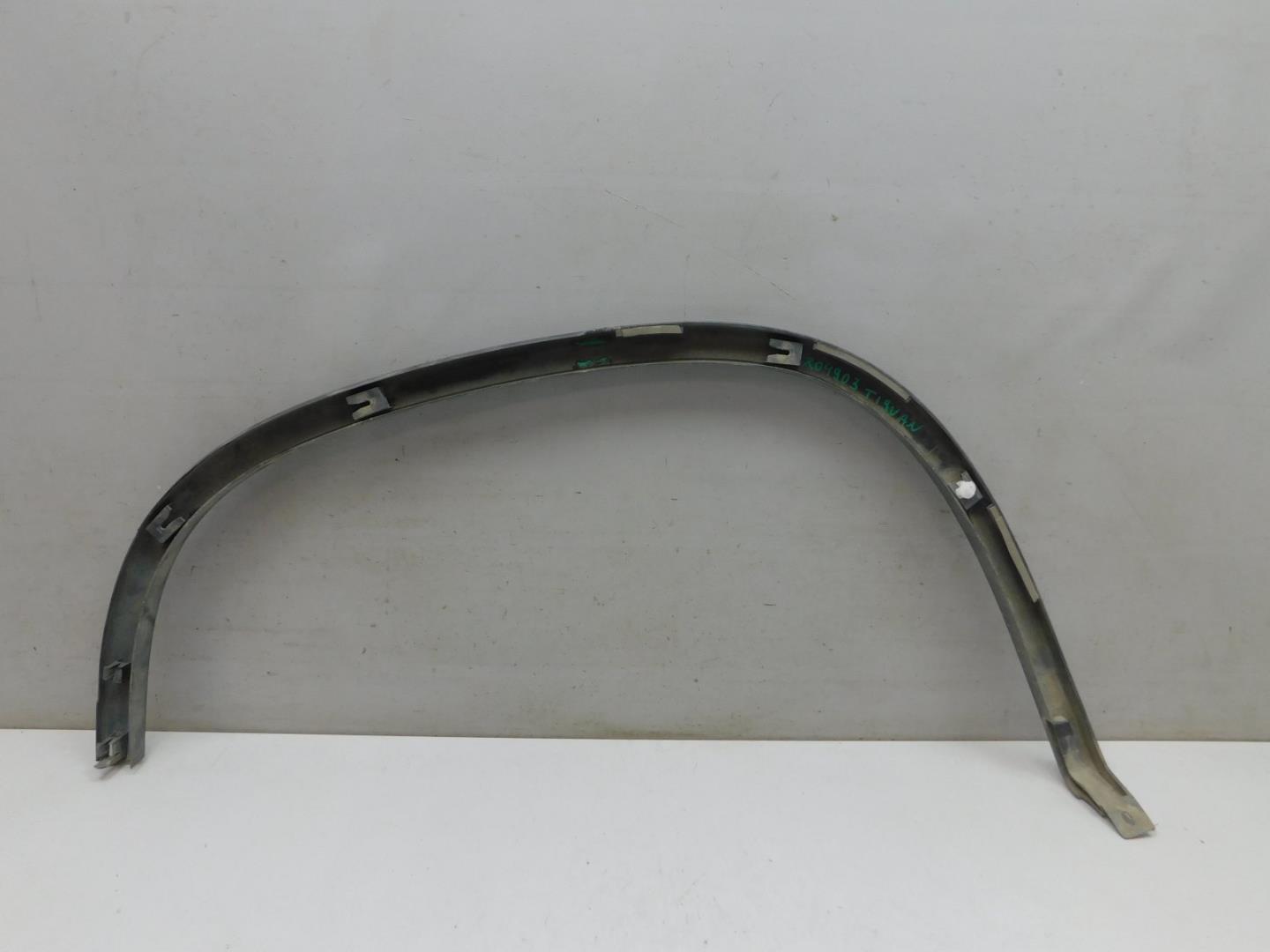 Накладка заднего крыла левого