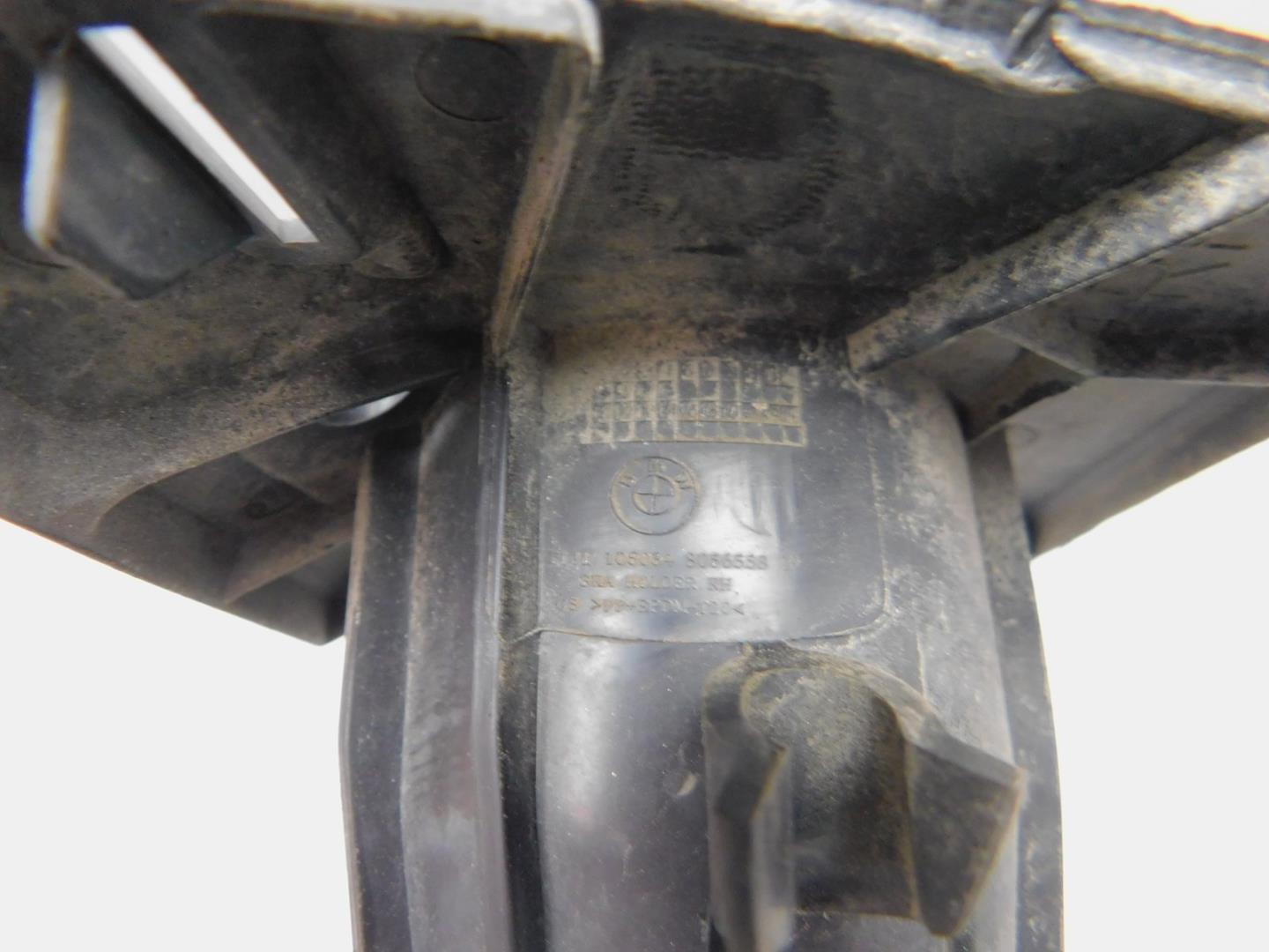 Кронштейн форсунки омывателя фары