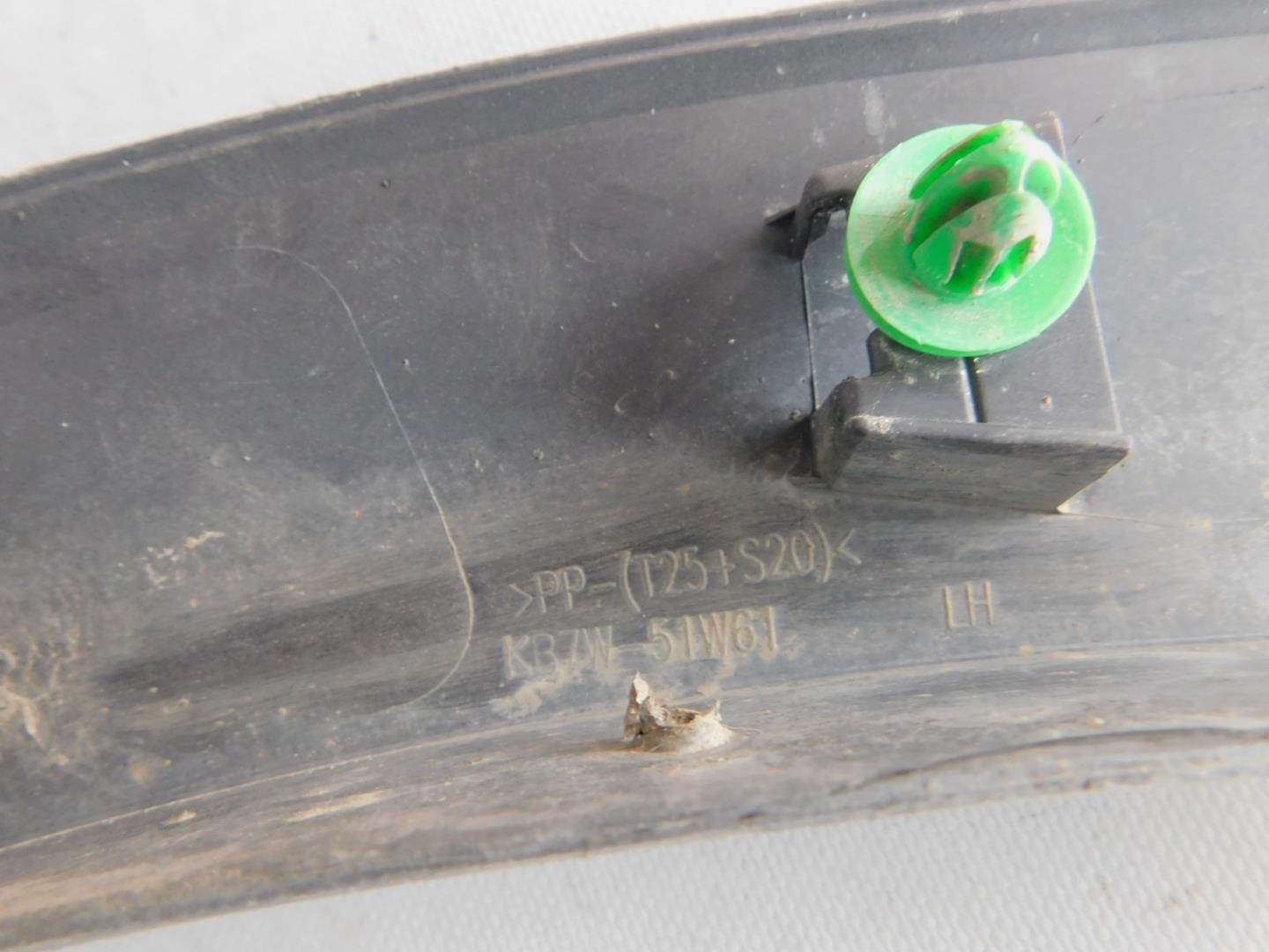 Накладка заднего крыла левого