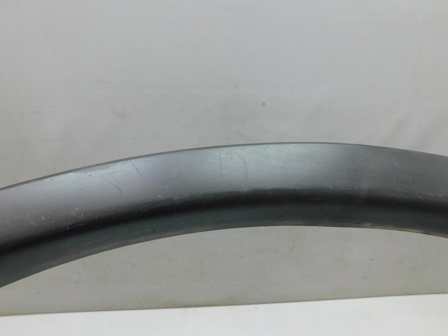 Накладка заднего крыла левого