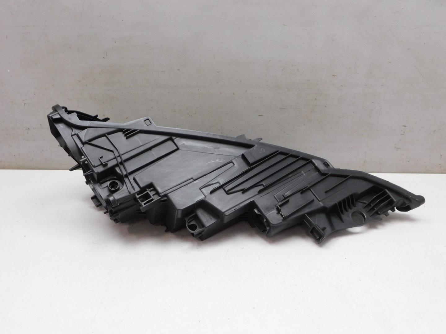 Корпус фары левой