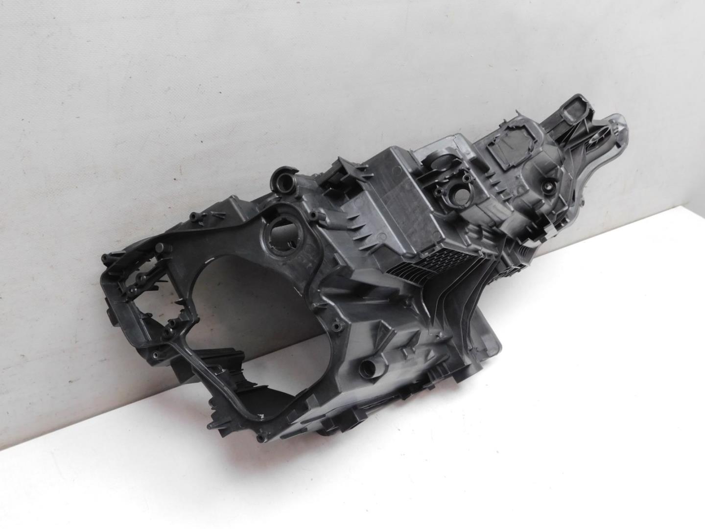 Корпус фары левой