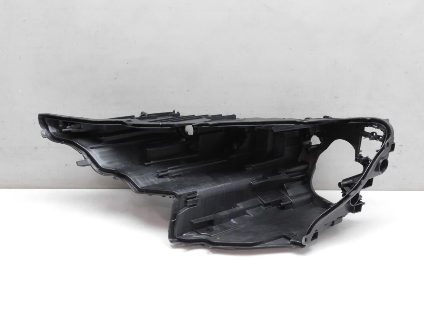 Корпус фары левой