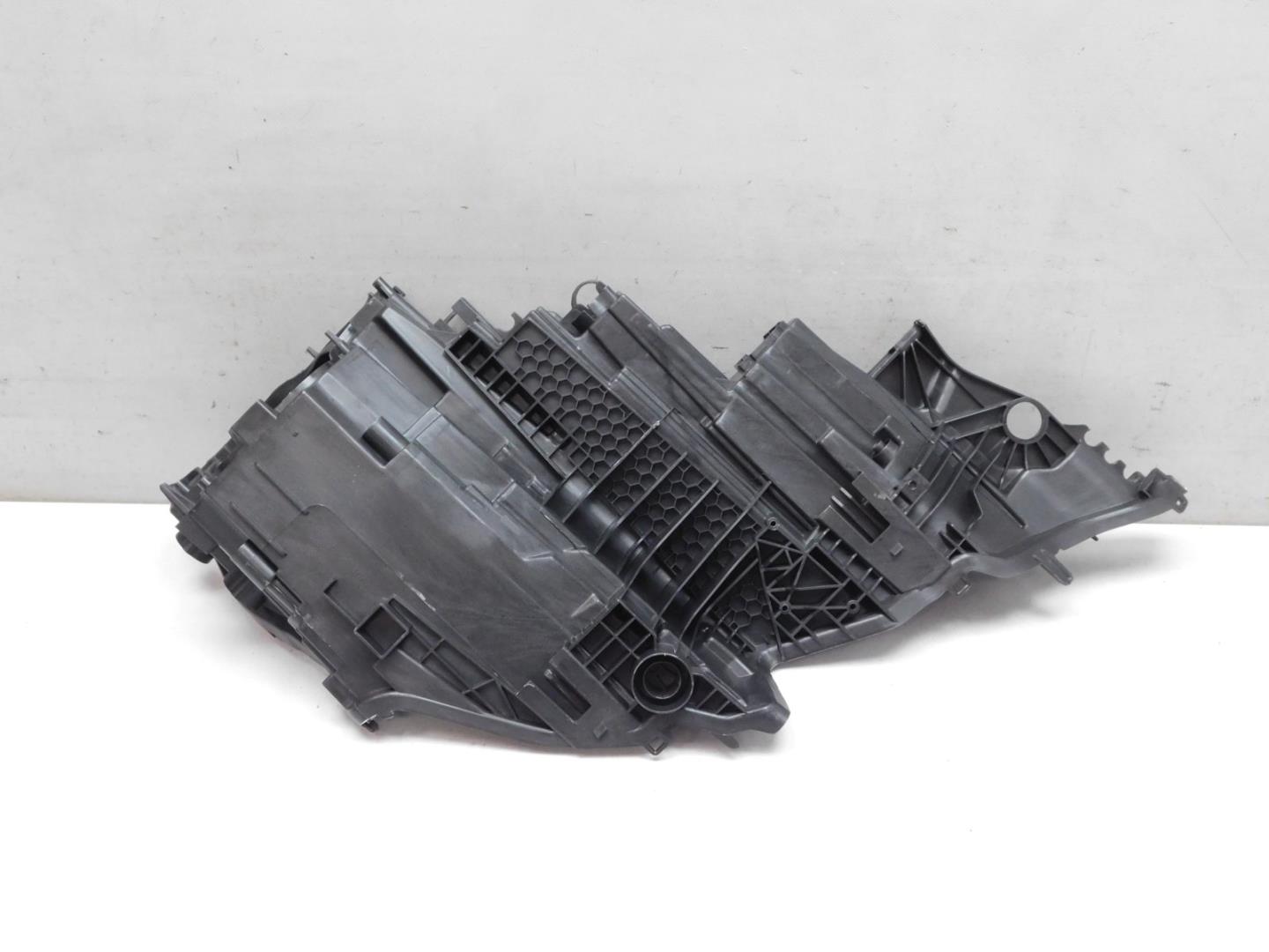 Корпус фары левой