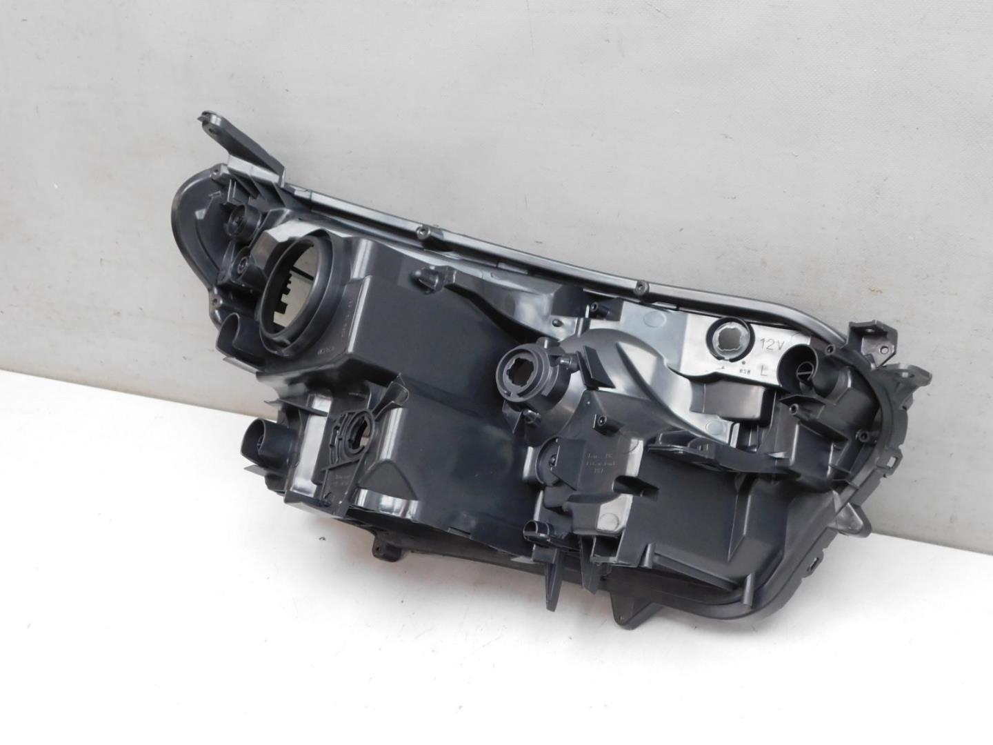 Корпус фары левой