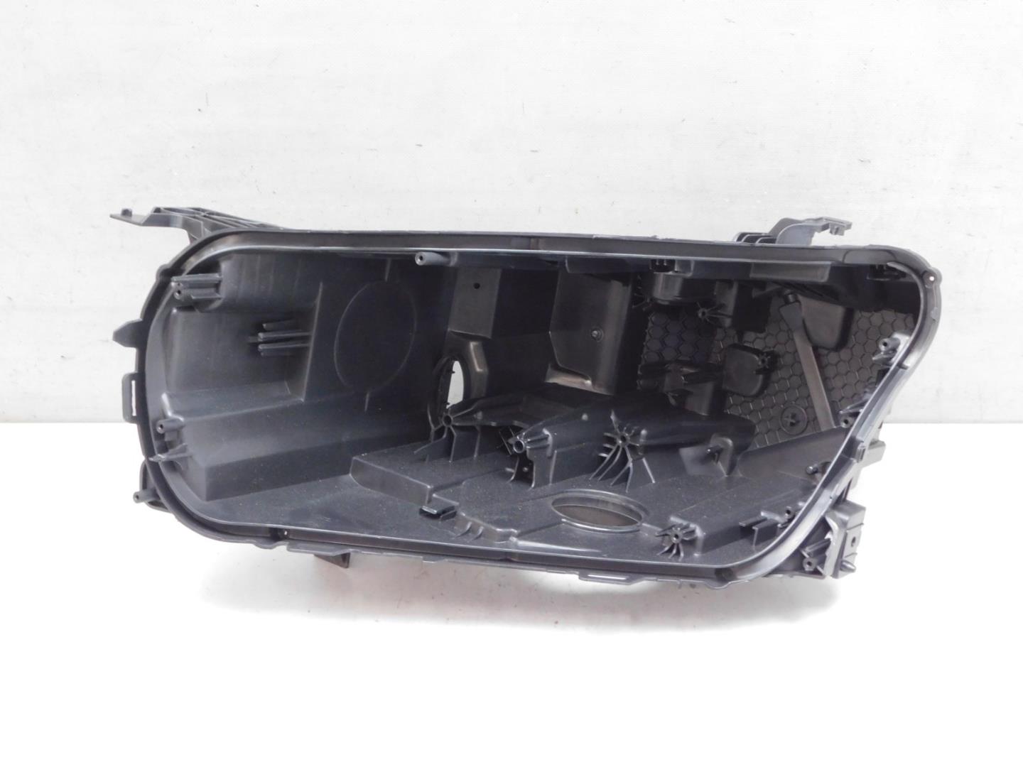 Корпус фары левой