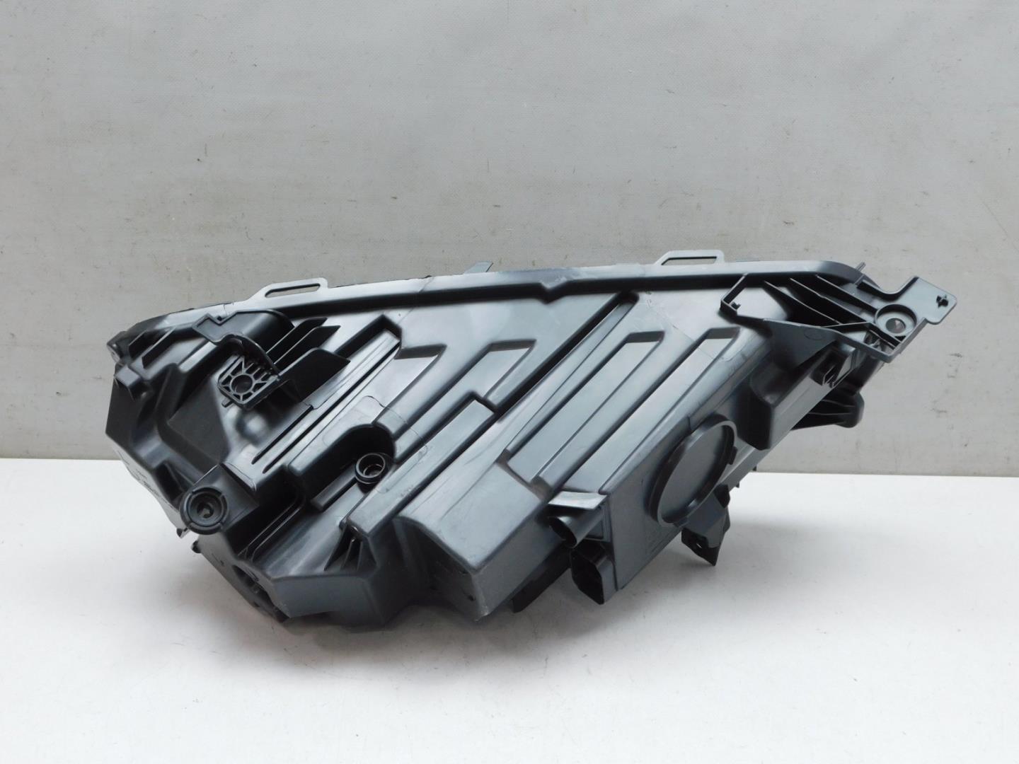 Корпус фары левой