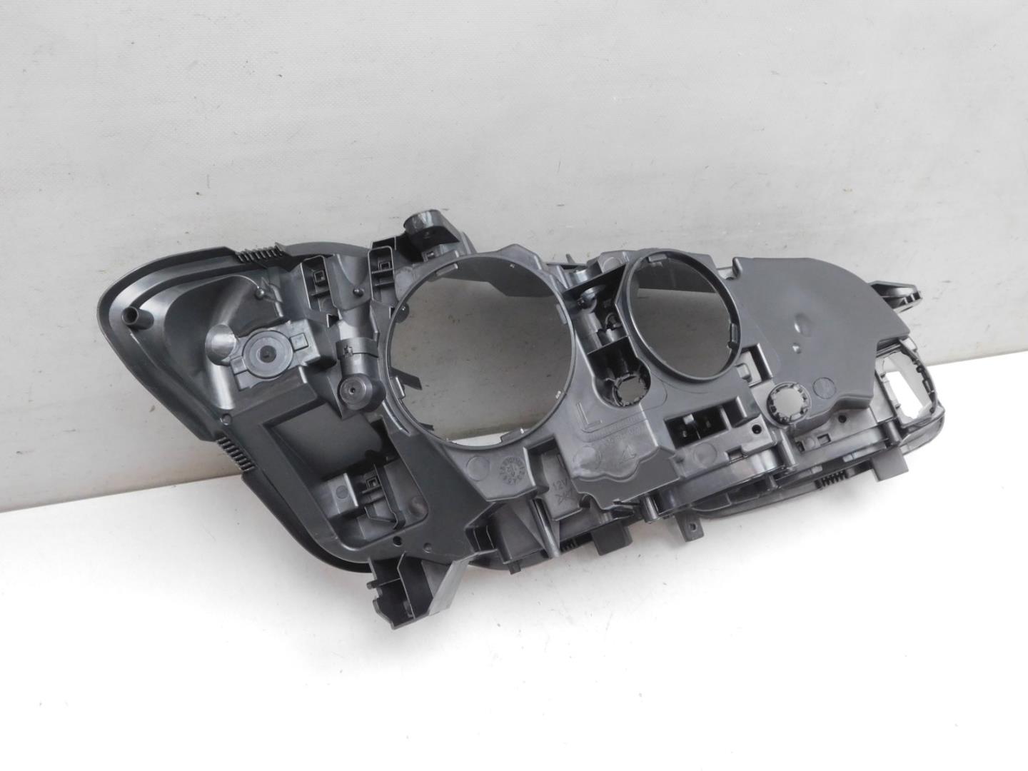 Корпус фары левой